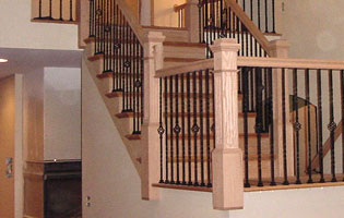 Wooden Staircase Iron Rails